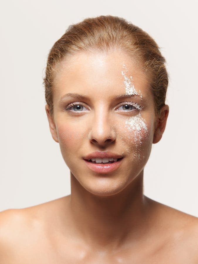 Young Woman Peeling Off A Facial Mask Stock Photo - Image of glamour ...