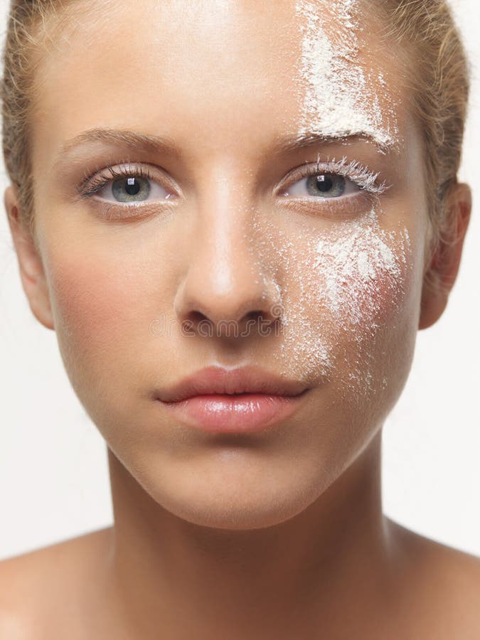 Young Woman Peeling Off A Facial Mask Stock Photo - Image of glamour ...
