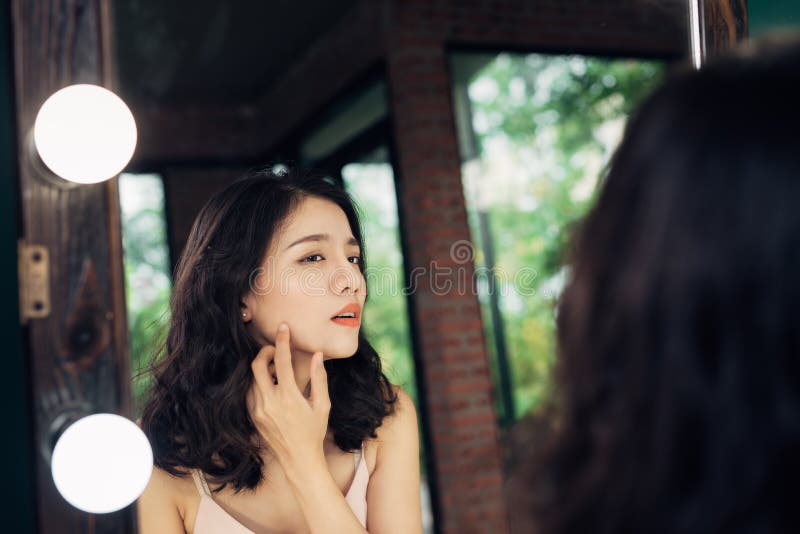 Beauty, skin care lifestyle concept. Young asian woman with acne stock photography Beauty, skin care lifestyle concept. Young asian woman with acne stock photography
