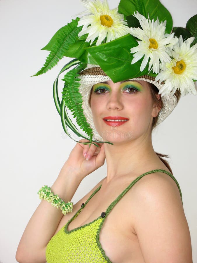 Beauty smiling girl in her hat