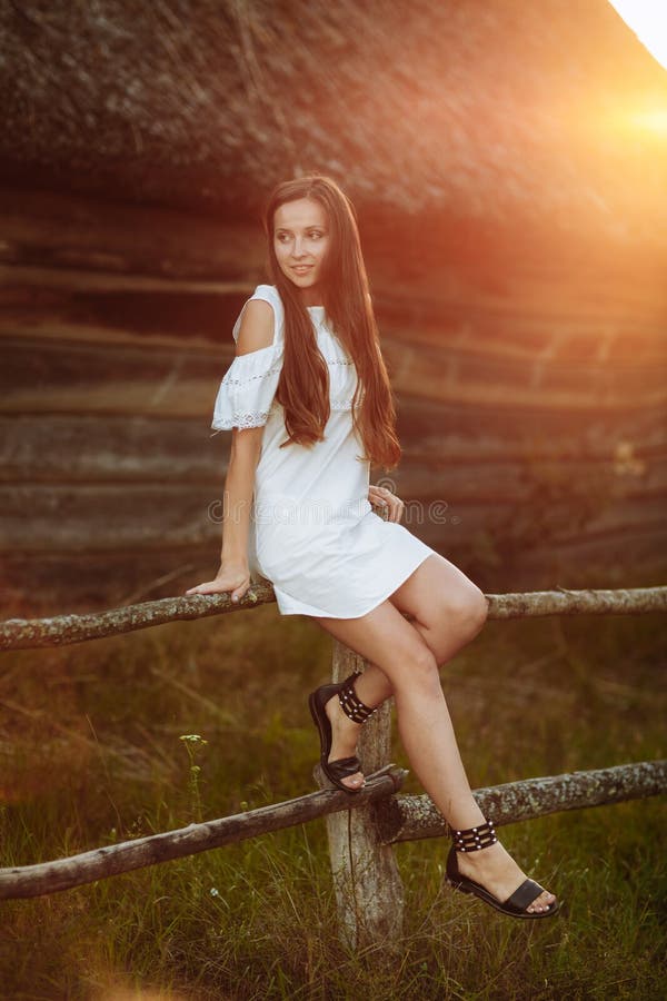 Beauty Summer Outdoor Portrait of Young Woman in White Dress in Sunset ...