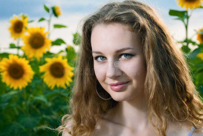 Beauty woman in sunflower