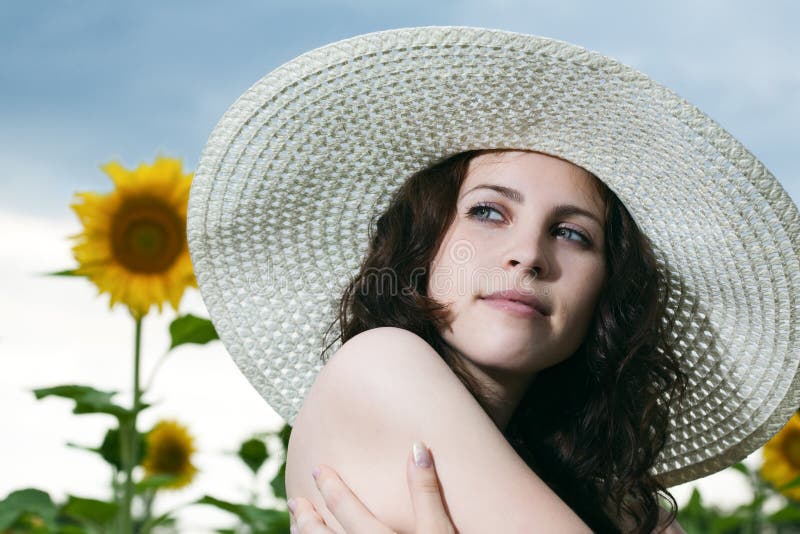 Beauty woman in sunflower