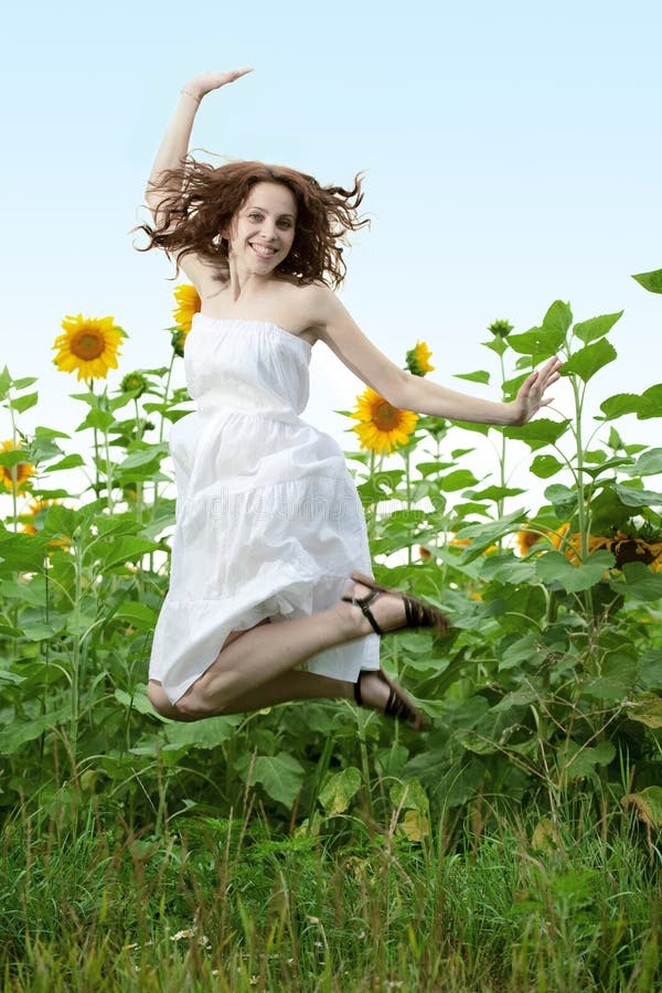 Beauty woman in sunflower