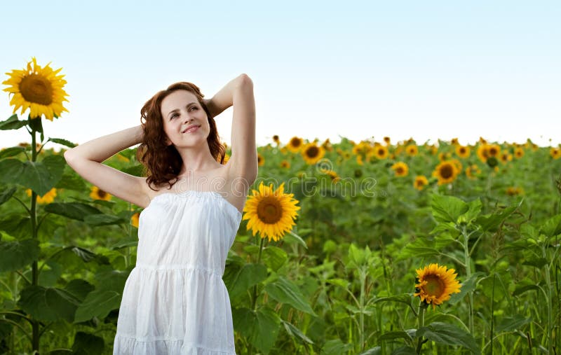 Beauty woman in sunflower