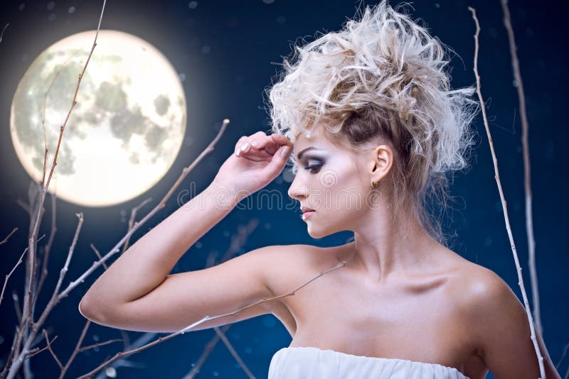 Beauty woman under moon