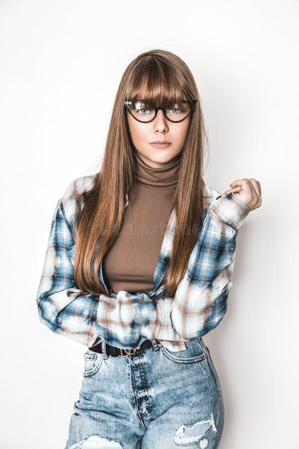 Beauty Young Girl with Long Smooth Hair and Glasses on White Background.  Young Model with Eyeglasses and Trendy Bangs Stock Photo - Image of hair,  beauty: 173839896