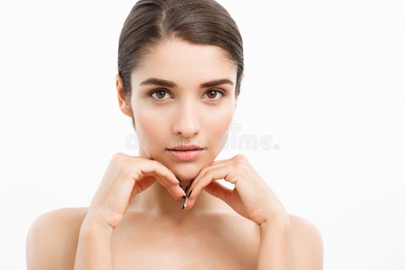 Beauty Youth Skin Care Concept - Close up Beautiful Caucasian Woman Face Portrait. Beautiful Spa model Girl with Perfect royalty free stock photo Beauty Youth Skin Care Concept - Close up Beautiful Caucasian Woman Face Portrait. Beautiful Spa model Girl with Perfect royalty free stock photo