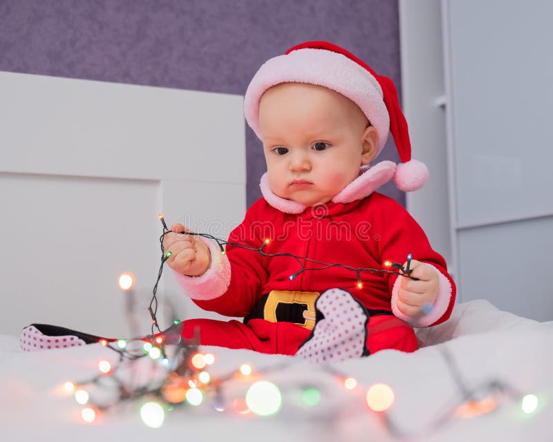 profundizar Paine Gillic juego 848 Bebé Vestido En Santa Claus Fotos de stock - Fotos libres de regalías  de Dreamstime