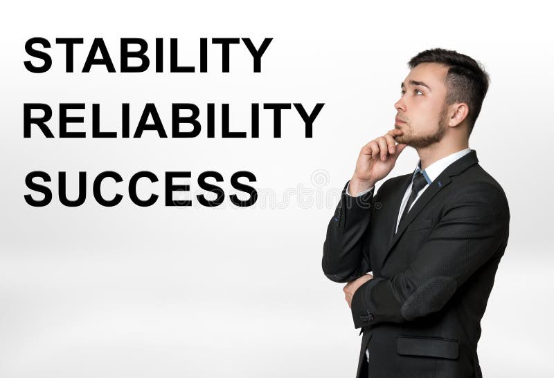 Bebouwd portret van een zakenman denken met & x27 die; stabiliteit, betrouwbaarheid, success& x27; woorden naast hem stock afbeeldingen Bebouwd portret van een zakenman denken met & x27 die; stabiliteit, betrouwbaarheid, success& x27; woorden naast hem stock afbeeldingen