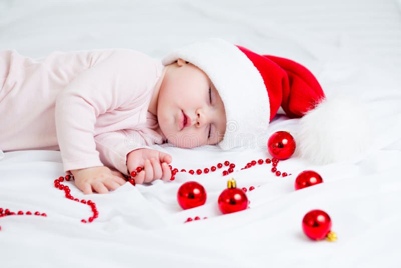 Bebé dulce durmiente Papá Noel fotografía de archivo