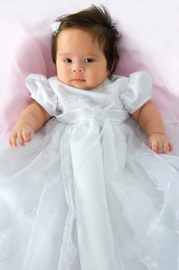 Bebé no vestido do baptismo fotos de stock Bebé no vestido do baptismo fotos de stock