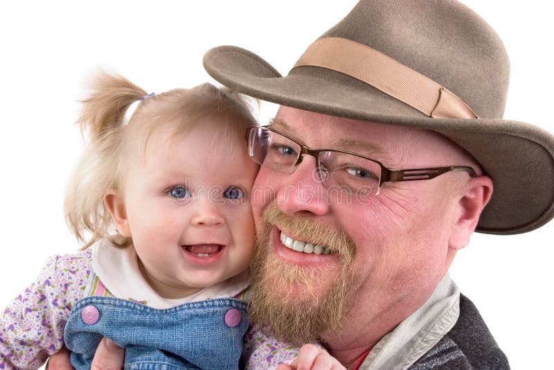 A cute baby girl and her grandfather. A cute baby girl and her grandfather