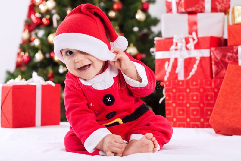 Bebê de sorriso engraçado Papai Noel imagens de stock Bebê de sorriso engraçado Papai Noel imagens de stock