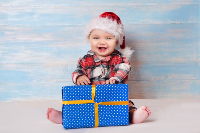 Bebê do Natal no chapéu de Santa fotos de stock Bebê do Natal no chapéu de Santa fotos de stock