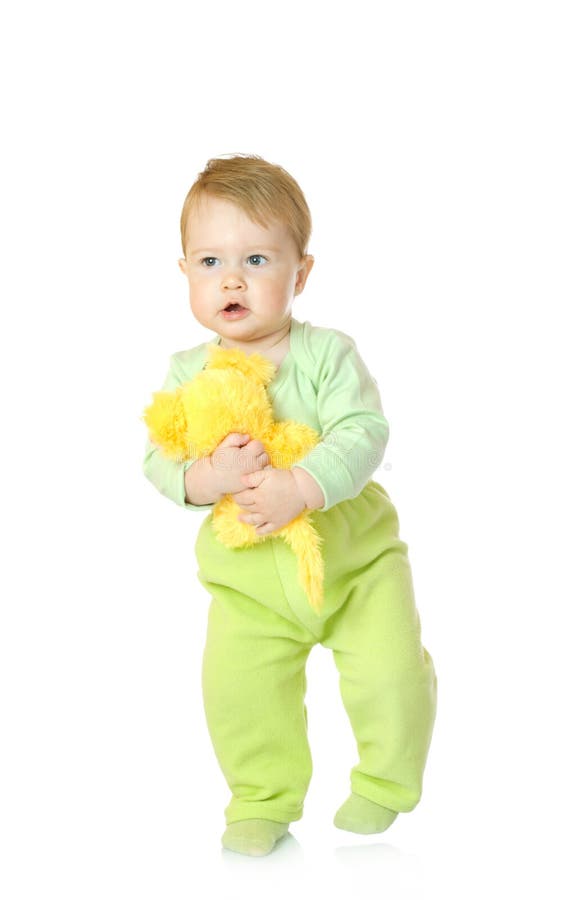 Bebê pequeno com o rato do brinquedo isolado fotografia de stock Bebê pequeno com o rato do brinquedo isolado fotografia de stock