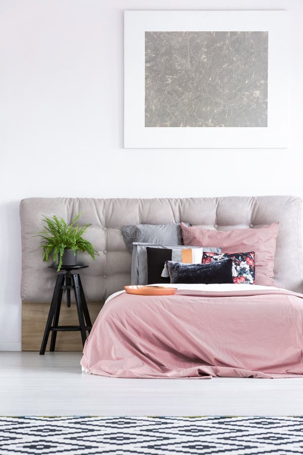 Bed with black pillow stock image. Image of pastel, overlay 99188253