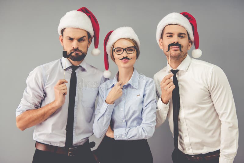 Bedrijfs mensen die Kerstmis vieren stock foto Bedrijfs mensen die Kerstmis vieren stock foto