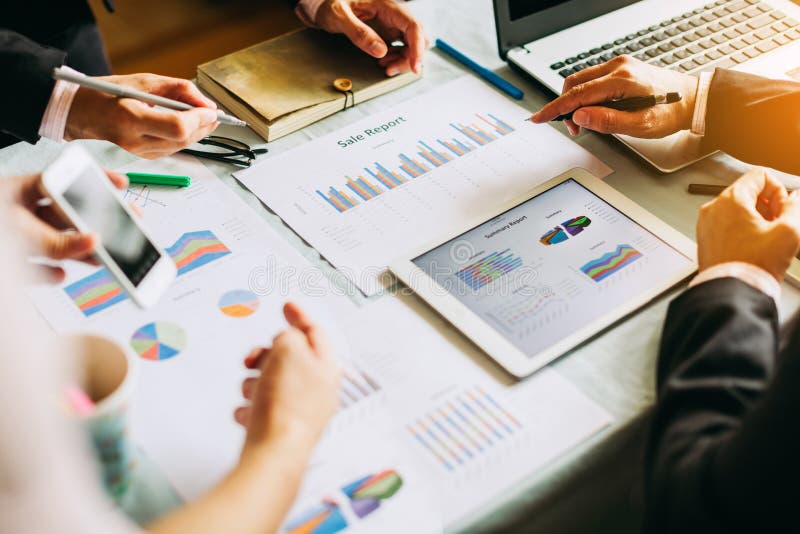 Businessman investment consultant analyzing company financial report balance sheet statement working with digital graphs. Concept picture for stock market, cash, fund,and business economy flow. Businessman investment consultant analyzing company financial report balance sheet statement working with digital graphs. Concept picture for stock market, cash, fund,and business economy flow.