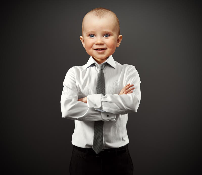 Bedrijfsmens met babygezicht stock afbeeldingen Bedrijfsmens met babygezicht stock afbeeldingen