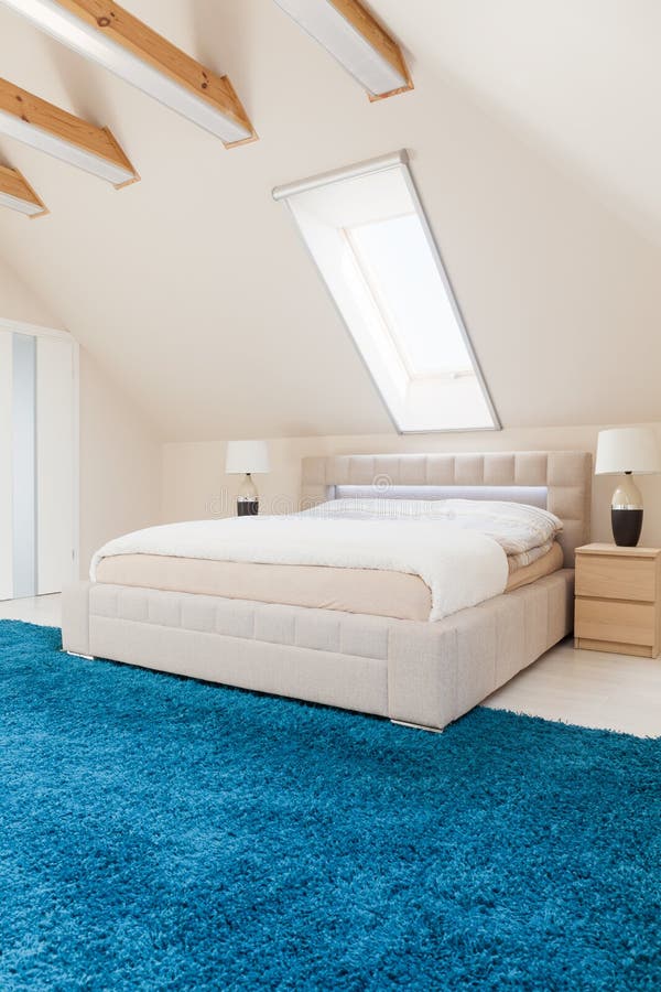 Bedroom with blue carpet stock image. Image of domestic 57884627