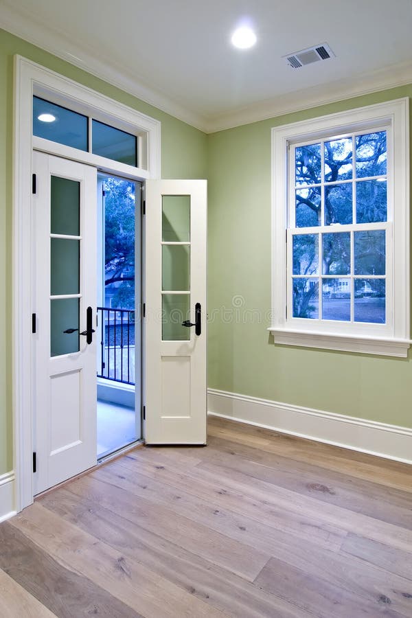 Bedroom with double doors stock photo. Image of open, house 5181372