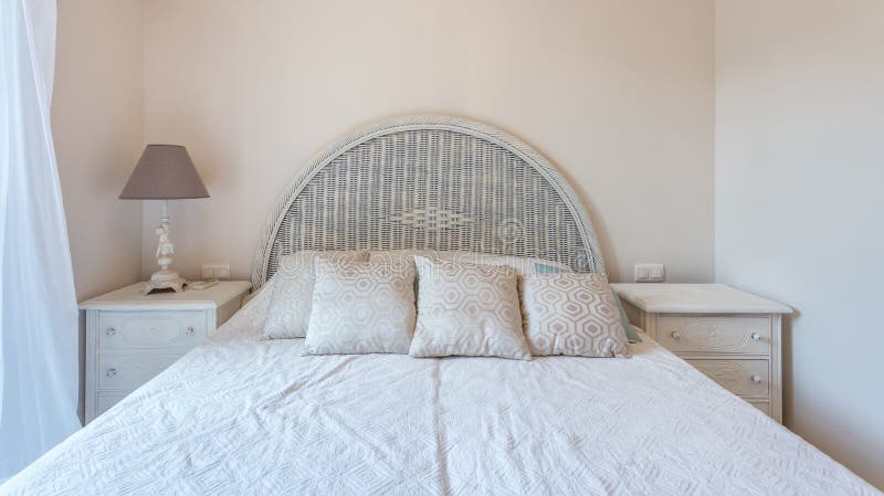 Bedroom in modern style with bed and pillows. Front view. royalty free stock photo