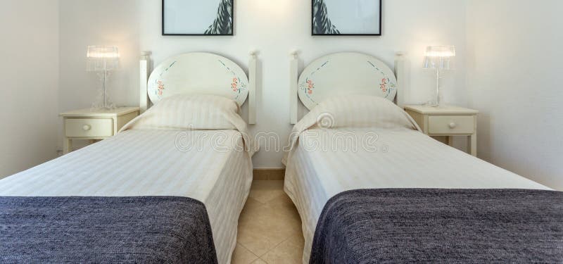 Bedroom in modern style with bed and pillows. Front view. stock photography