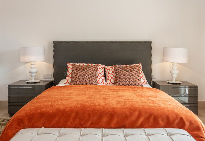 Bedroom in modern style with bed and pillows. Front view. royalty free stock photos