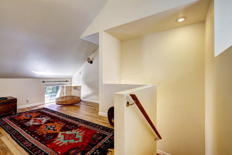Bedroom with vaulted ceiling and sitting area. Bedroom with high vaulted ceiling, sitting area and colorful rug stock photography Bedroom with vaulted ceiling and sitting area. Bedroom with high vaulted ceiling, sitting area and colorful rug stock photography