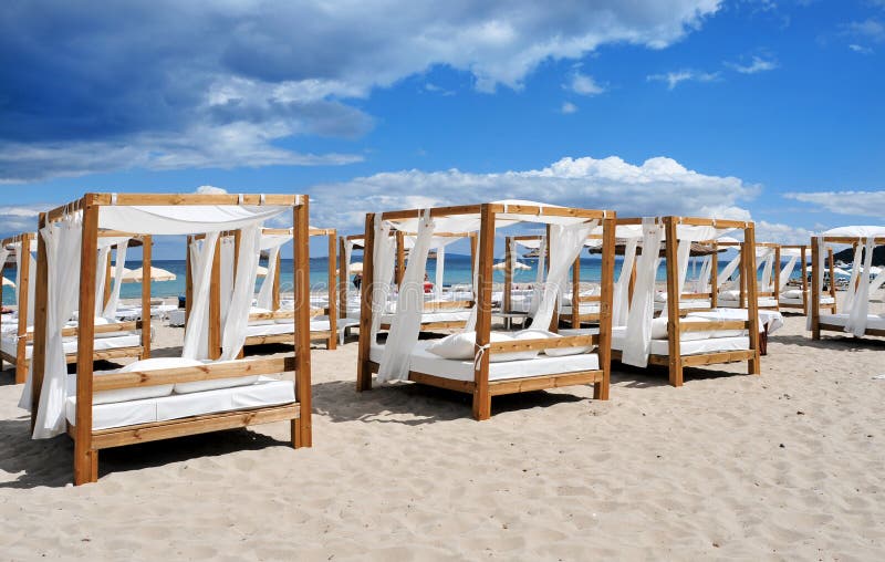 Beds and sunloungers in a beach club in Ibiza, Spain