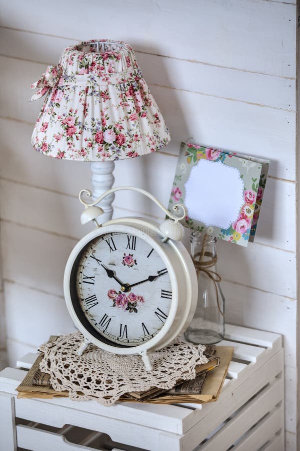 Bedside Table with Lamp and Alarm Clock Stock Image - Image of lamp