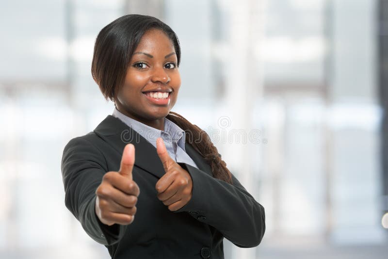 Business woman showing thumbs up. Business woman showing thumbs up