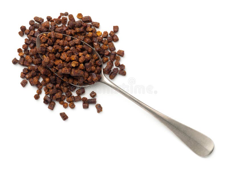Bee Pollen Propolis On Silver Spoon Isolated royalty free stock photos Bee Pollen Propolis On Silver Spoon Isolated royalty free stock photos