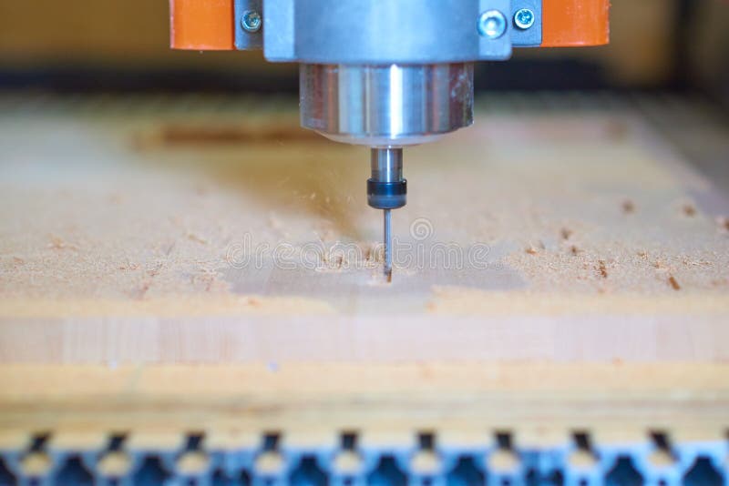 Beech wood milling process with sawdust royalty free stock image