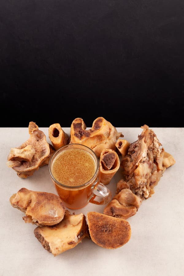 Beef Bone Broth in Clear Mug, Top View. Healthy Beverage with Natural