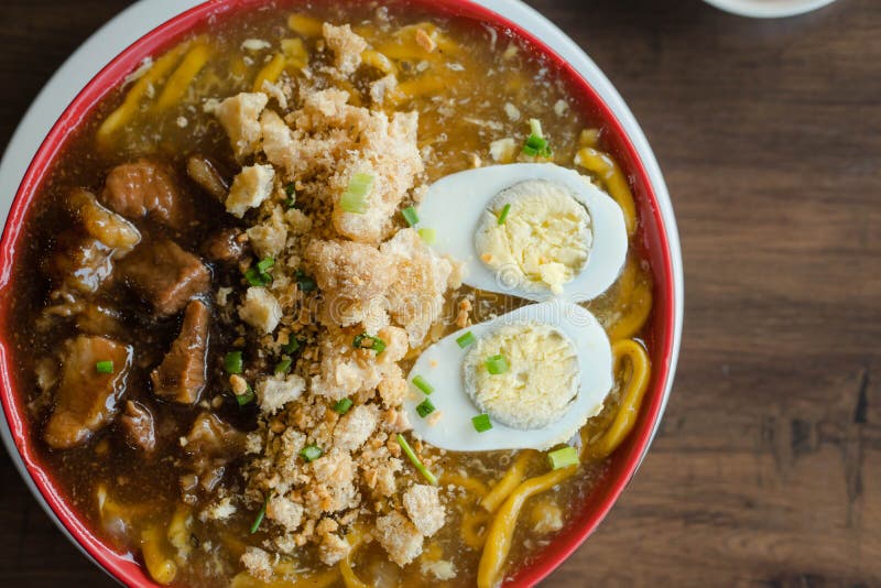 Beef brisket in thick egg noodle soup or also known as beef pares lomi