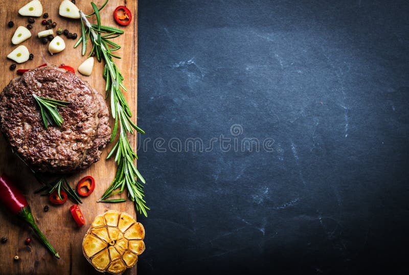 Beef burger cutlet with herbs and spices stock image Beef burger cutlet with herbs and spices stock image