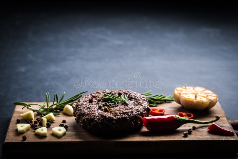 Beef burger cutlet with herbs and spices royalty free stock photos Beef burger cutlet with herbs and spices royalty free stock photos
