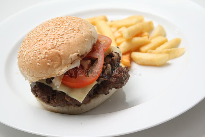 Beef burger with fries royalty free stock photography