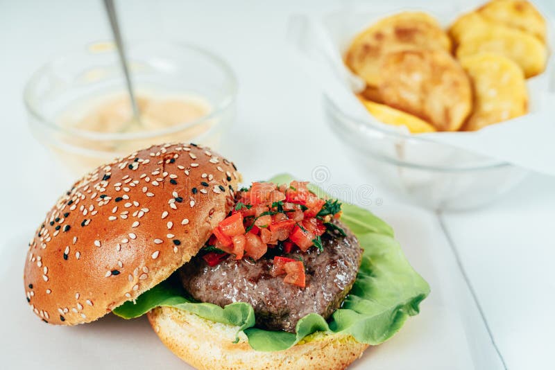 Beef Burger with Lettuce Salad, Tomato and Chips Stock Image Image of cholesterol, delicious