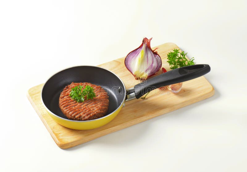 Beef burger patty in pan stock image. Image of beef, frying 57722487