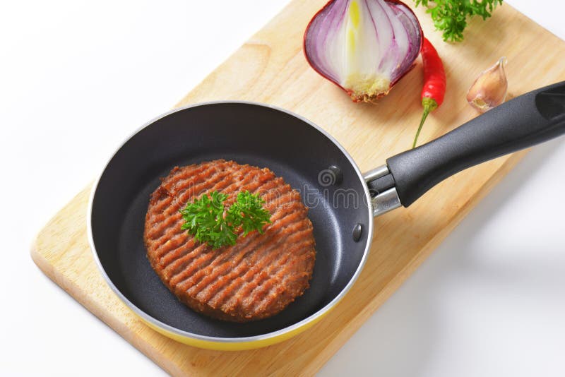 Beef burger patty in pan stock image. Image of view, patty 57722607