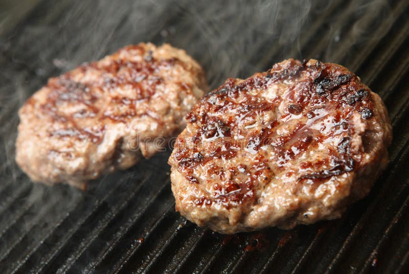Beef Burgers Cooking on Griddle Plate Stock Image Image of meal
