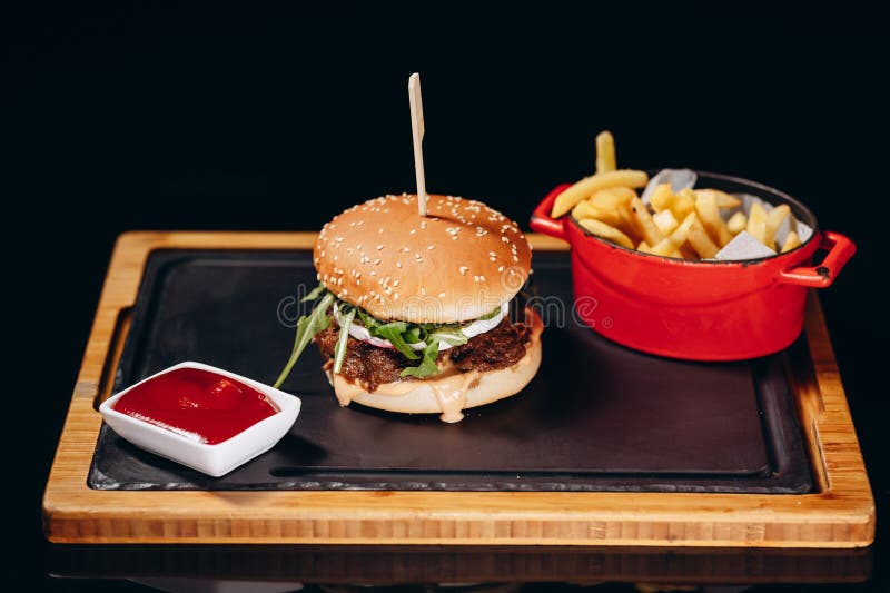 Beef Egg and Bacon Burger Served in Restaurant. American Food Stock