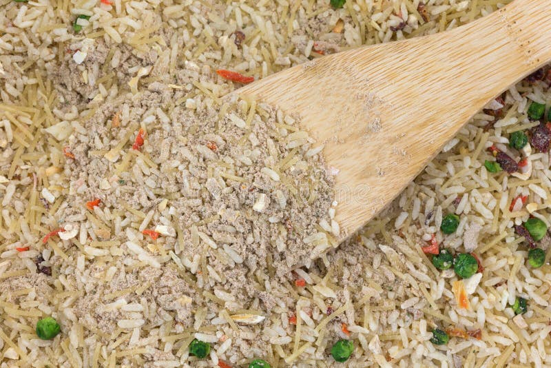 Beef Flavored Rice Mix with a Wood Spoon Stock Photo - Image of