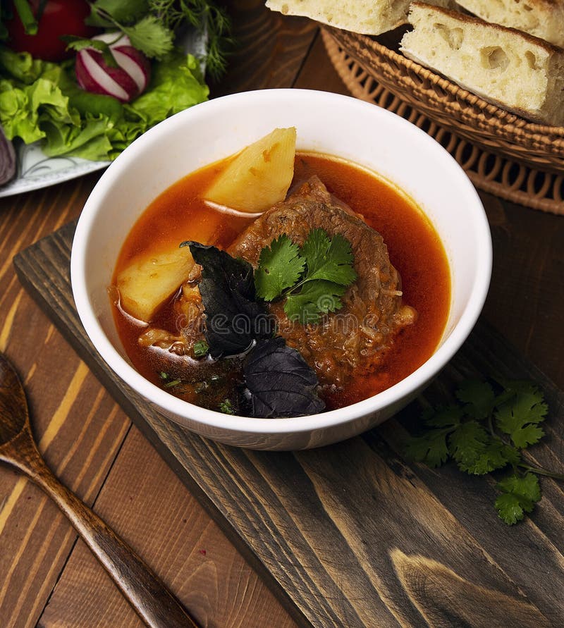 Beef, Lamb Stew, Bosbash Soup with Potatoes, Basilic and Parsley in Tomato Sauce. Stock Image
