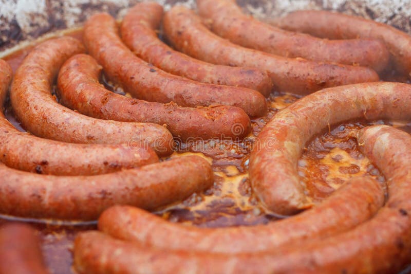 Beef and pork sausages stock photo. Image of fire, picnic 80496002