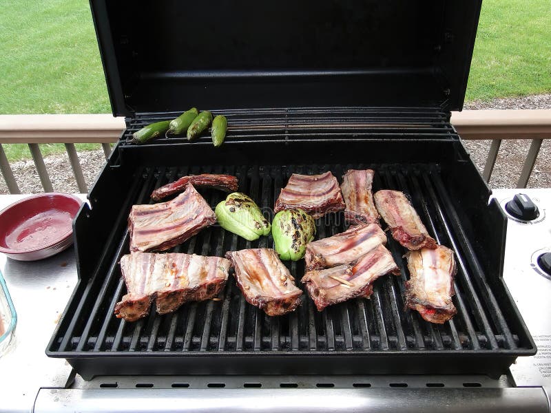 Beef short ribs on grill stock image. Image of marinade 241357051