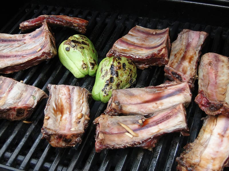 Beef short ribs on grill stock image. Image of grill 241357057
